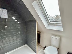 Store (Currently used as a Shower Room)- click for photo gallery